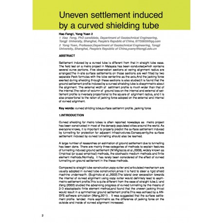 Uneven settlement induced by a curved shielding tube